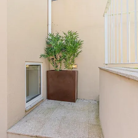 With Beautiful Garden In The Heart Of The *