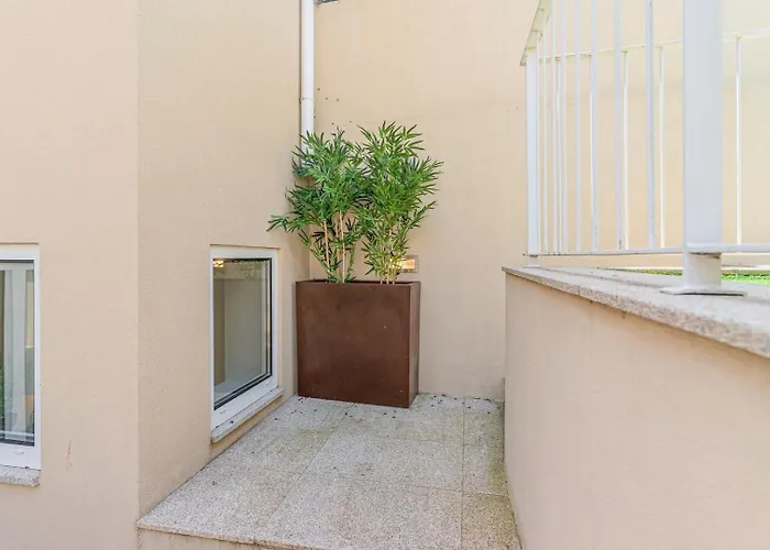 With Beautiful Garden In The Heart Of The *